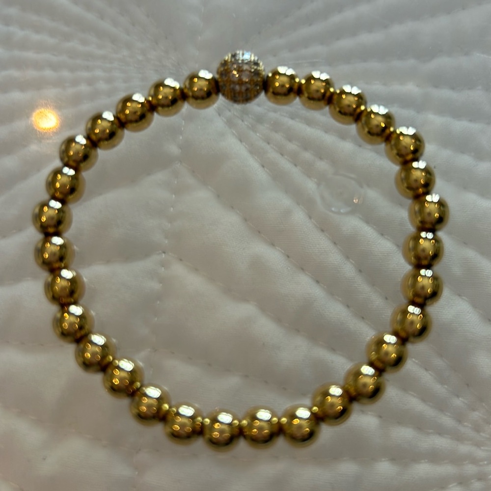 Gold beaded bracelet- never worn.